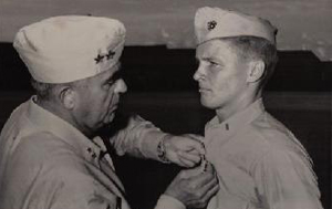 General Gieger awarding Monk the silver star on Pavuvu after Peleliu.